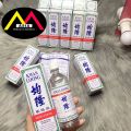 Dầu nóng KWAN LOONG Oil gia truyền giảm đau khớp nhức mỏi bong gân bầm tím singapore 57ml. 