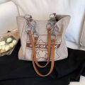 ARCTIC HUNTER Bag ผู้หญิงใหม่ กระเป๋าอเนกประสงค์กระเป๋าถือวิทยาลัยนักศึกษากระเป๋าสะพายกระเป๋ากระเป๋าขนาดใหญ่ความจุผ้าใบกระเป๋าผู้โดยสาร. 