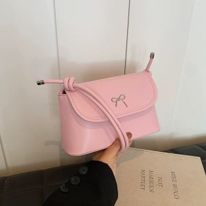 miumiubagshop(M2171) กระเป๋าสะพายไหล่หนังพียู ด้านหน้ามีโบว์ ทรงน่ารัก
