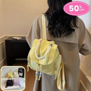 ZEFAN 【COD】กระเป๋าสะพายคู่สีทึบสาววิทยาลัยมินิ 2025 โรงเรียนเกาหลีใหม่เดินทางกระเป๋าเป้สะพายหลังน้ำหนักเบาชั้นเรียนเดินทางกระเป๋านักเรียน