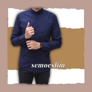 {\n \"article\": \" Kemeja Polos Pria: Kemeja Formal & Santai Untuk Pria Modern