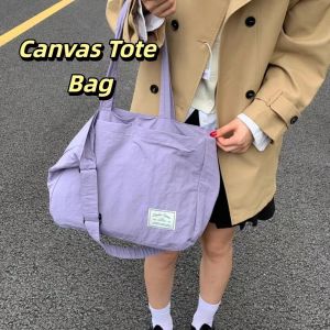 PRAYERF กระเป๋าหลายช่อง กระเป๋าโท้ตความจุขนาดใหญ่ ผ้าสีพื้น ยามว่าง กระเป๋าสะพายไนลอน แบบพกพา แบบมินิมอล กระเป๋าถือน้ำหนักเบา นักเรียน