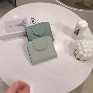 Ví da thật ngắn cho phụ nữ thương mại quốc tế mới lớp trên cùng bằng da bò kẹp thẻ kẹp tiền cho phụ nữ ins