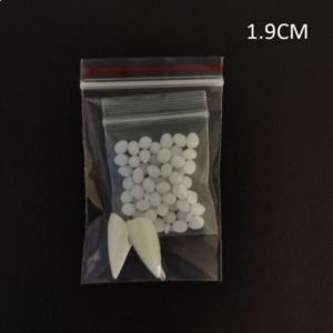 DYJJD 1 Pair Simulated Resin Fangs Resin Adhesive Fake Teeth Repair Teeth with Solid Glue Dentures Halloween