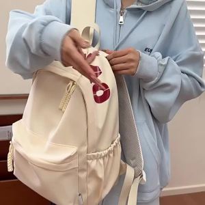AE Korean-style lightweight backpack for middle school students simple and versatile waterproof nylon large capacity outdoor casual use available for distribution