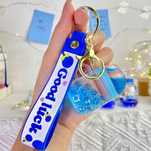 Keychain Cute Mix Cartoon Astronaut Lollipop Milk Tea Cup Fish Cloud Acrylic Blue Liquid Keychain Backpack Keytag