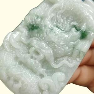 Green Floating Patches rare old-school Natural Type-A Jadeite-Jade crafted with traditional Dragon as Pendant certificate weighs 34.91 grams measurement 60.6 * 38.8 * 8.2 mm (pendant302)