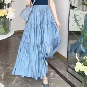 Female summer French style pear shaped figure with high waist and blue A-line skirt that covers the hips