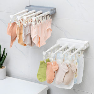 [คลังสินค้าพร้อม]ติดผนังพับเก็บได้พับชุดชั้นในราวตากผ้าหอพักเจาะฟรี Clothespin ถุงเท้าชุดชั้นใน Windproof การจัดเก็บคลิป