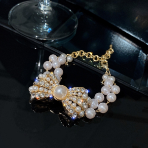 ฉบับภาษาเกาหลีอารมณ์ใหม่ผูกโบว์สร้อยคอมุกหญิงการออกแบบความรู้สึกเฉพาะกลุ่มโซ่ไหปลาร้าสตรีสร้อยคอโชคเกอร์ตามกระแสสำหรับเครื่องประดับ Woemn