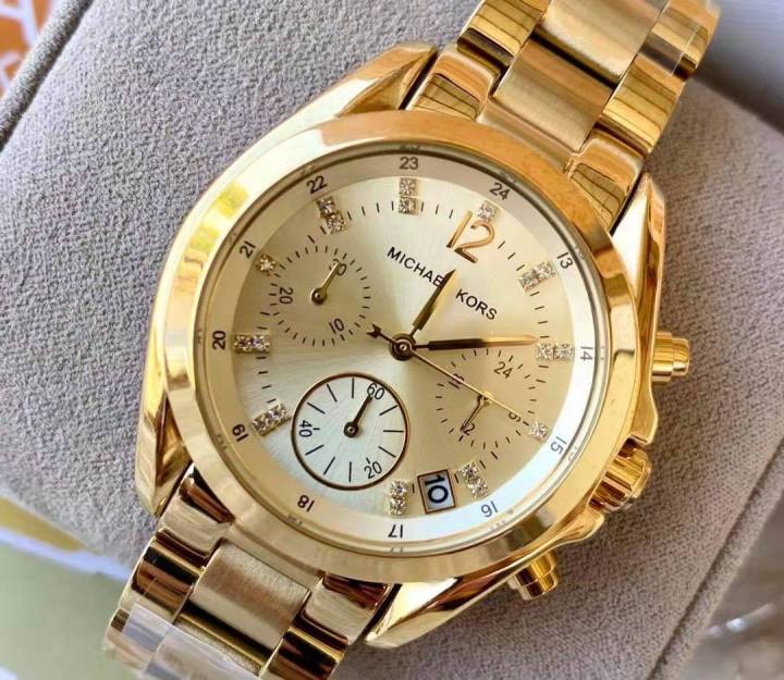 mk mother of pearl watch