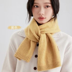 Plain-colored knitted scarves for women perfect for autumn and winter. Simple stylish and versatile design. Thick soft and warm with a Korean-inspired look.