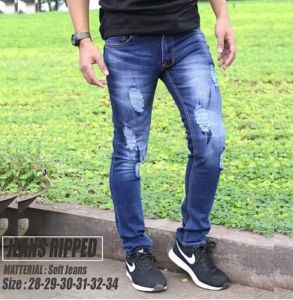 Celana Panjang Jeans Pola Ripped Bahan Denim Warna Biru