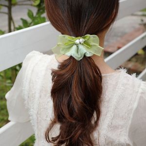 Cột tóc voan hoa lưu ly trắng mix nơ phong cách tiểu thư