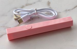 đèn pin hơ móng uv mini cầm tay mới