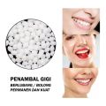 Penambal Gigi Berlubang isi 50 Butir Temptooth Temporary Repair Gigi Bolong Patah Renggang Ompong Retak Ready Stok. 