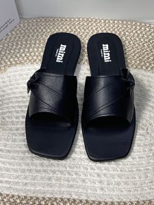 New Ladies Flat sandals with square toe flat sole decorative knot available in navy rust and beige.