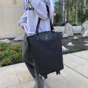 Túi xách du lịch bánh xe di chuyển tiện lợi Glamour Bag (Black) (Travel Bag)