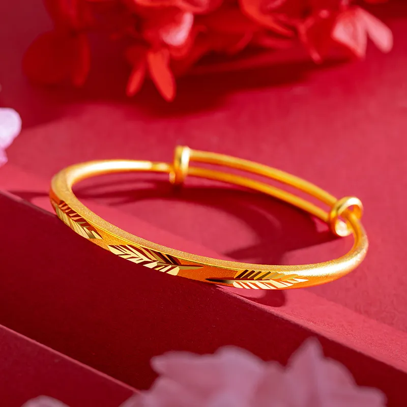 Ladies gold on sale expanding bangle