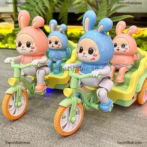 [COD] SweetBabiese ของเล่นดนตรีกระต่ายขี่จักรยานสามล้อของเล่นกระต่ายสำหรับเด็กและแม่สุดน่ารักของเล่นรถสามล้อไฟฟ้าพร้อมการเคลื่อนไหวปั่นจักรยานจำลอง