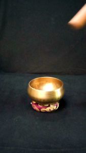 singingbowl beaten hammer