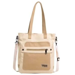 CATHERIN BAGS#4069 Korean canvas Women`s tote bag features top handles for hand carrying adjustable crossbody strap.