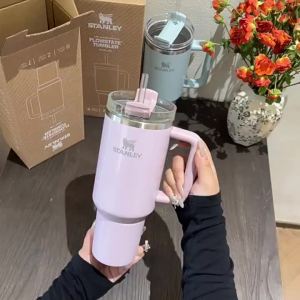 original stanley Insulated cup in pearlescent blue and pearlescent pink with straw