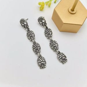 Fashionable and sophisticated trendy womens accessories: rose pendant earrings niche light luxury simple stud earrings