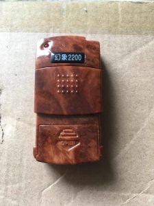 Tay điều khiển cửa cuốn SY2200 mã gạt tần số 330mhz