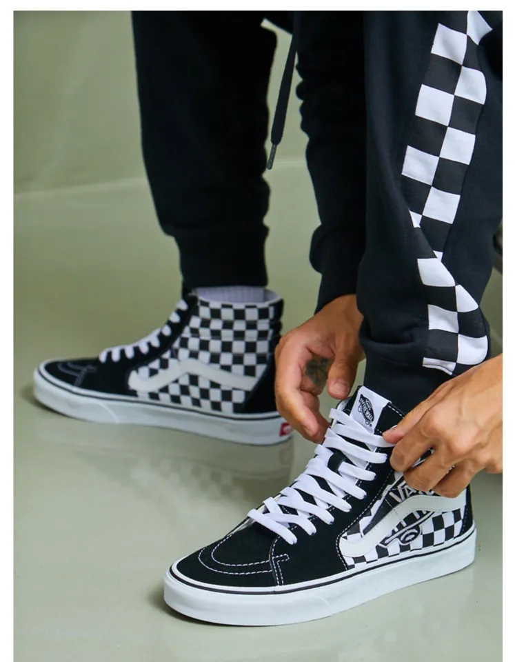 High top black hotsell and white checkered vans