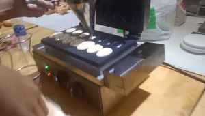 Máy Làm Bánh Đường Phố Mẫu 14 Quả Trứng Gà Egg Waffle Maker Electric 220V PVN4666