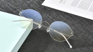 FONEX Bluelight Blocking Eye Protection Glasses for Men and Women Rimless Blue Light Eyeglasses Female Eyewear with Nylon Lens AB011