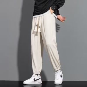 Mens Korean Loose Elastic Waist Casual pants Plain Breathable Striped Jogger pants Bound Feet Ice Silk Loose Casual Trousers
