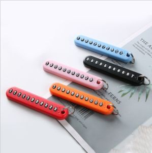C.three. DIY Phone Number Card Plate Car Keys Anti-lost Keyring Keychain Pendant Decor