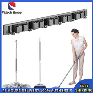 Vktech Wall Mount Broom Holder with Hooks Durable Plastic Organizer for Kitchen and Laundry