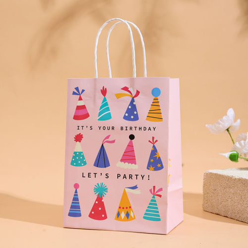 How to Decorate Plain Goodie Bags With Wrapping Paper and Ribbons