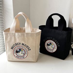 YIXINA ตัวอักษรสำหรับเด็ก กระเป๋าผ้าใบแคนวาส ชุดเดรสพิมพ์ลาย ผ้าอ๊อกซ์ฟอร์ด กระเป๋าใส่อาหารกลางวัน น่ารักน่ารักๆ เหมาะกับการแต่งตัวทุกสไตล์ กระเป๋าถือแบบถือ สาวๆ