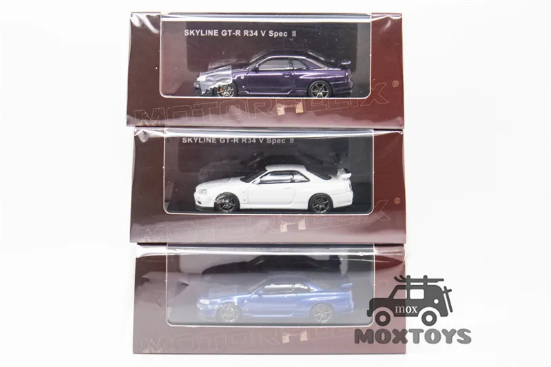 Nissan Skyline GT-R R34 V-Spec II - Miniature Motorhelix 1/64 - Métal - Neuve
