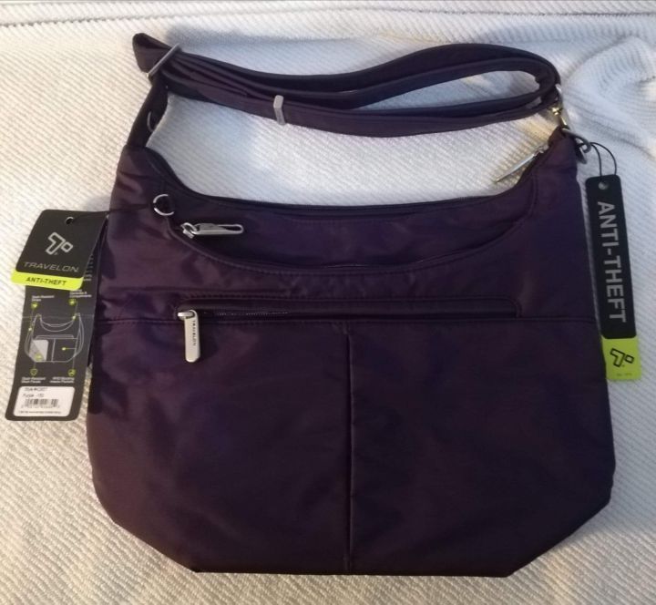 Travelon sling bag price sale