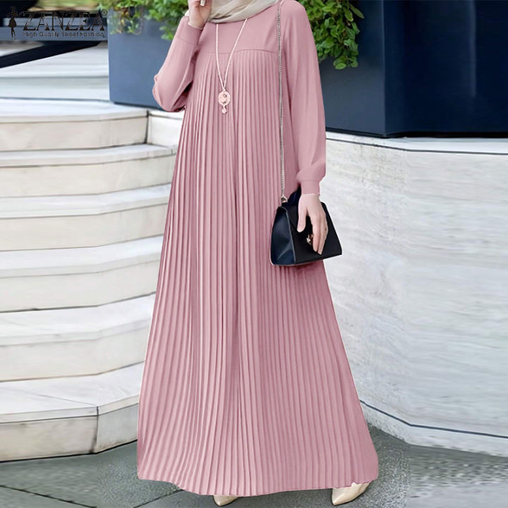 sachin and babi light blue dress Smiling young asian muslim woman wearing green casual dress on hijab feels  confident and joyful main image 0