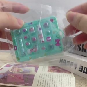 Luminous14 lưới Bàn phím Thần Tài Keychain sáng tạo ngón tay Báo Chí đồ chơi giảm căng thẳng Ba lô mặt dây chuyền cho trẻ em
