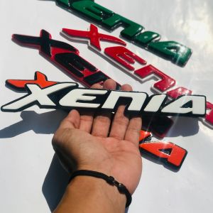 EMBLEM MOBIL XENIA VARIASI MOBIL DAIHATSU DENGAN HURUF TIMBUL 3D BAHAN FIBERGLASS
