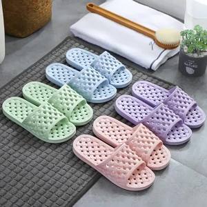 [Free Shipping] New smiley face home slippers for men indoor bathroom hotel couples flat-bottomed water-draining slippers for women