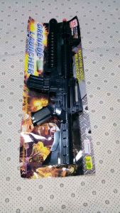 Dynamic Playtime: Plastic Toy Gun with Realistic Sounds for Kids"