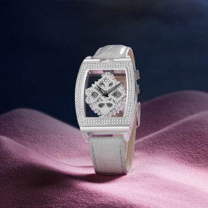 New women’s watch with a barrel-shaped hollowed-out transparent rotating dial and rhinestone embellishments exuding an elegant and sophisticated style