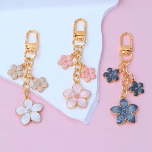 INEXTIN Alloy Sakura Keychain Cherry Blossom Enamel Coating Cherry Blossom Keychain Durable Pearl Accent Cute Bag Charm For Women