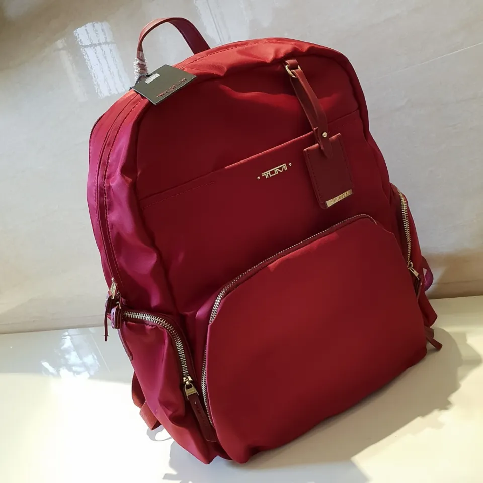 Tumi cheap red bag