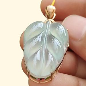 Premium Quality Icy Translucent Light Green Hue Natural Type A Jadeite Jade crafted as Leaf set on 18k Gold as Pendant certificate weighs 5.07 grams measurement 40.5 * 18 * 7.5 mm (18kp42)