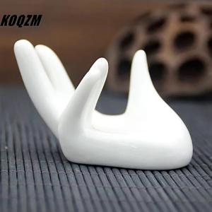 KOQZM Ceramic Hand Shaped Boiled Egg Cup Holder Leak Ceramic Guanyin Hand Rest Egg placement tool Hand Rest Shelf Decoration