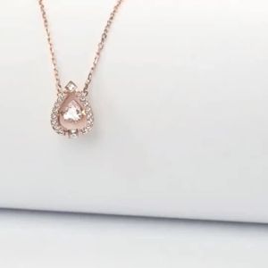 Swarovski Swan necklace with silver crystal and moissanite suitable as a gift for Christmas.